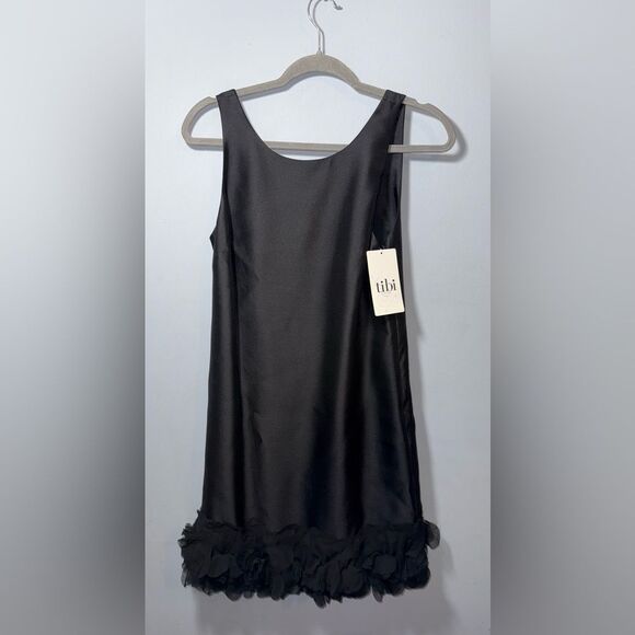 Tibi Black Satin Bow Back Wool & Silk Mini Dress with Petal Hem & Bow Size 6 NWT - Picture 1 of 9